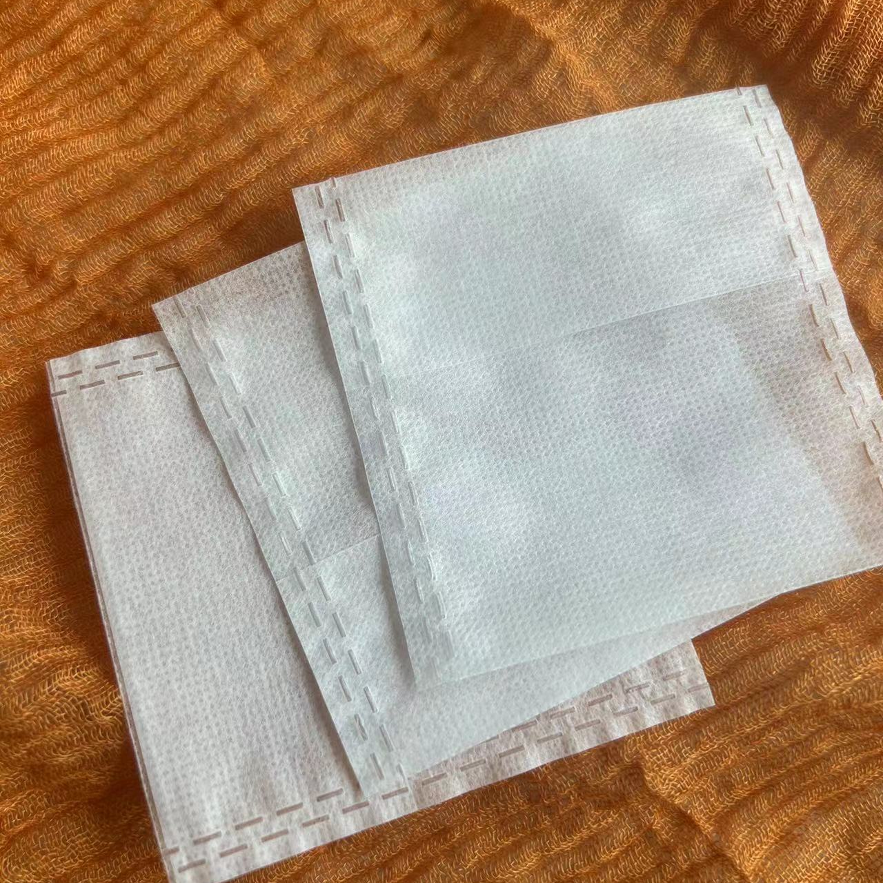 Non-woven reflex tea bag